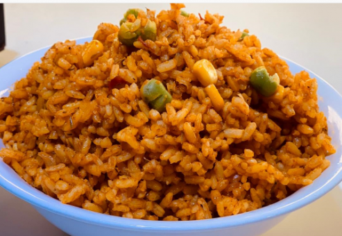 https://admin.kilimanjaro-restaurants.com/storage/gallery/thumbnail/K-Jollof_Rice__large_1720434380.png