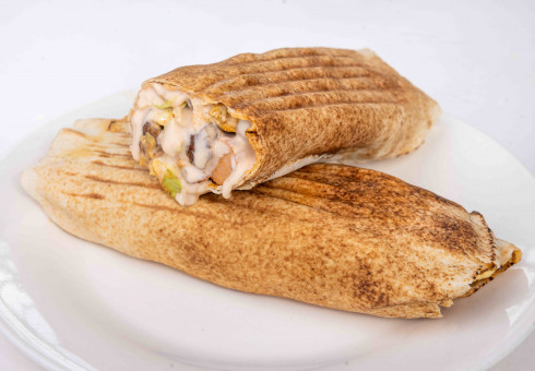 https://admin.kilimanjaro-restaurants.com/storage/gallery/thumbnail/Shawarma_jpg_large_1713272238.jpg
